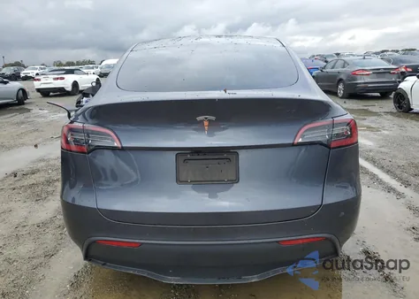 2023 Tesla Model Y from USA, damaged, VIN 7SAYGDED0PF945725